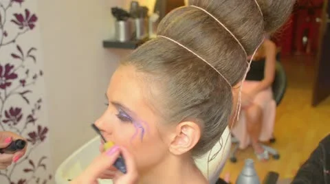 Model putting makeup Stock Footage 12169791