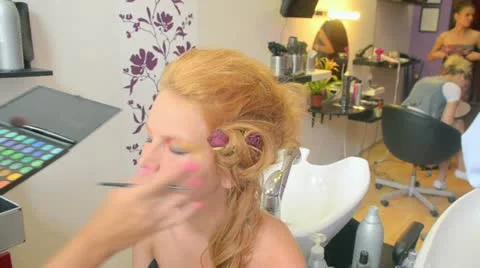 Model putting makeup Stock Footage 12173155
