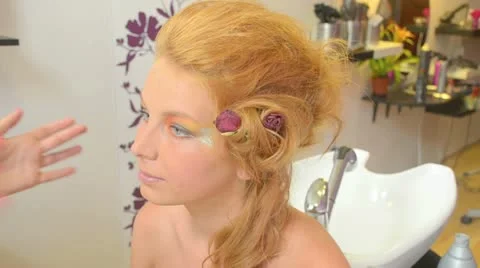 Model putting makeup Stock Footage 12173251