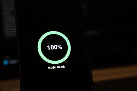Model Ready under a full mint green progress circle at 100 percent on a black Stock Photos