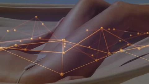 Model reclining on lounger starting tech... | Stock Video | Pond5