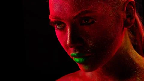 Model with red face and green lips Stock Photos