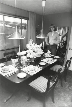 Model In Regency-style Dining Room Of Show House At Ideal Home Exhibition 1977. Stock Photos