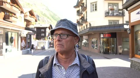 Model Released - Elderly caucasian man looking at camera in slow motion Stock Footage 93176915