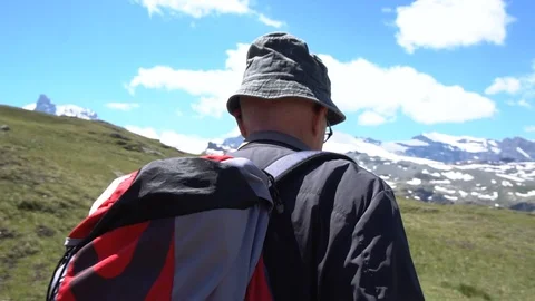 Model Released - Old Healthy Man Hiking in Mountains Stock Footage 93339313