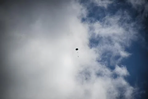 Model of a rocket on a parachute after flight Stock Photos