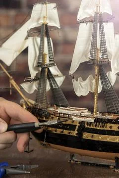 Model Ship Building handcraft on table with different materials Stock Photos
