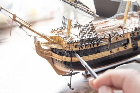 Model Ship Building handcraft on table with different materials Stock Photos
