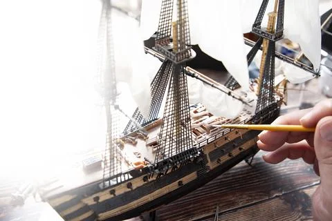 Model Ship Building handcraft on table with different materials Stock Photos
