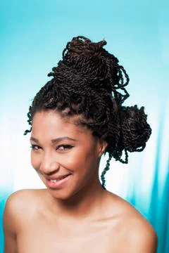 Model smiling on blue background Stock Photos