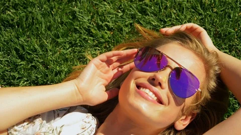 Model smiling with glasses on 스톡 동영상 107603266