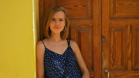 Model standing by the door Stock Footage 107012849