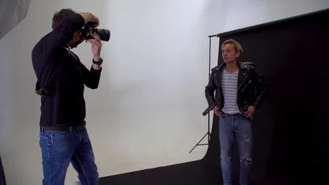 Model in the studio at the photo shoot Stock Footage 119713240