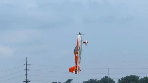 Model Stunt RC Plane hovers at show Stock Footage 91996641