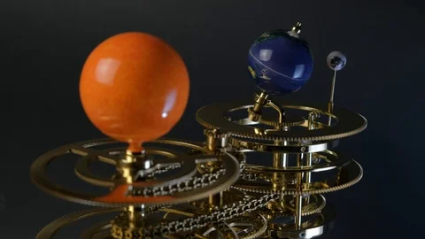 Model of the sun, earth and moon in miniature. Rotation of the earth around the Stock Footage 102896741