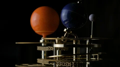 Model of the sun, earth and moon in miniature. Rotation of the earth around the Видео 102896896