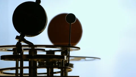 Model of the sun, earth and moon in motion. Slow motion. 4k Видео 102897086