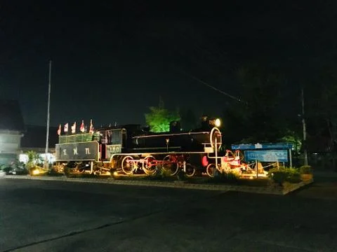 Model Thai old steam train in night scene 스톡 사진
