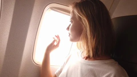 Model touching the window Stock Footage 107934262