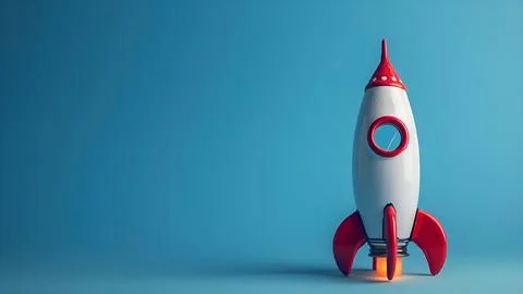 A model of a toy rocket on a blue background. Minimalistic banner for Fotos de archivo