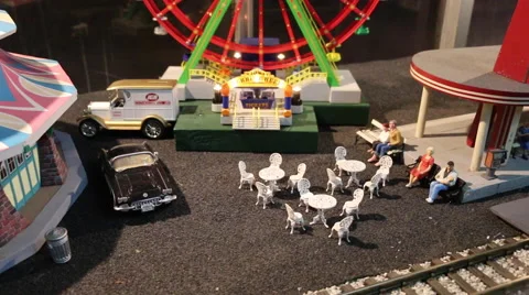 Model Train Ferris Wheel and Carousell Closeup Shot  Stock-Footage 58669780