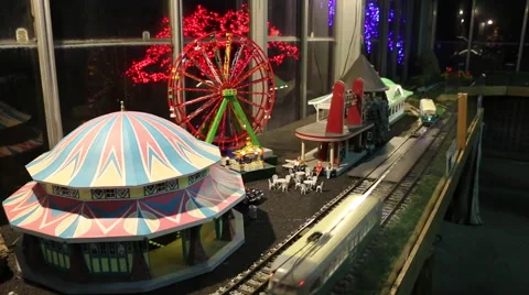 Model Train Ferris Wheel and Carousell Closeup Shot Vidéo 58669785
