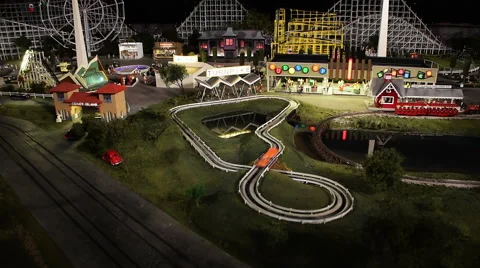 Model train set and amusement park Stock Footage 63236616