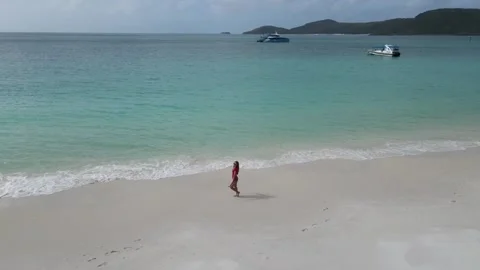 Model walking on the beach Video stock 229211902