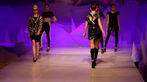 Model walking on the runway at a fashion show Stock Footage