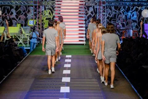 Model walking on stage Stock Photos