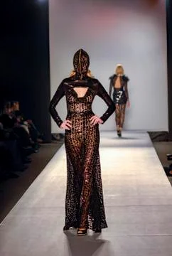 Model walking on stage Stock Photos