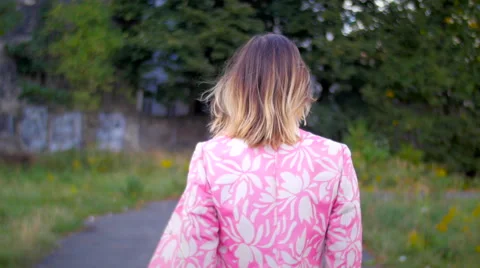 Model walking turning and looking in camera smiling Stock Footage 59735783