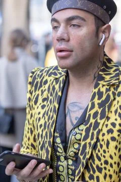 Model wearing brindle jacket and a black beret Stock Photos