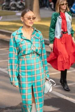 Model wearing a green checked long dress Stock Photos