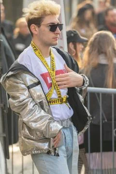 Model wearing a shiny silver jacket Stock Photos