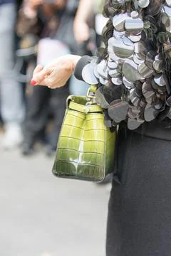 Model wears a green python handbag Stock Photos