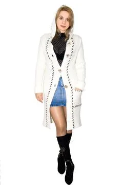 Model in a white knitted coat Stock Photos