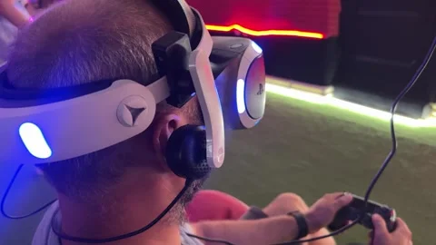 Model young man with beard in glasses of virtual reality Stock Footage 303970602