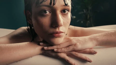 Model Young Wet Face in a bathtub Stock Footage 275501005