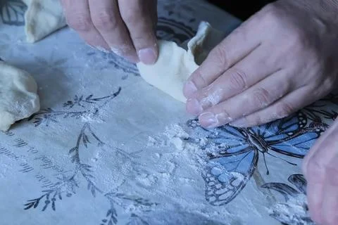 Modeling echpochmak on table sprinkled with flour Stock Photos