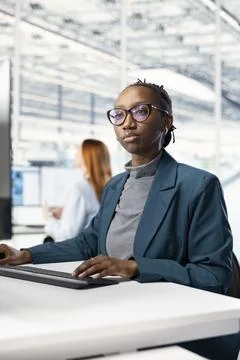Modeling integrated circuit systems, workstation and female engineer Stock Photos