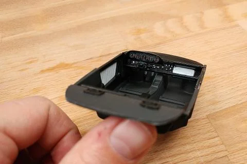 Modeling. Painting and assembling the interior of a scale car in black and wh Stock Photos