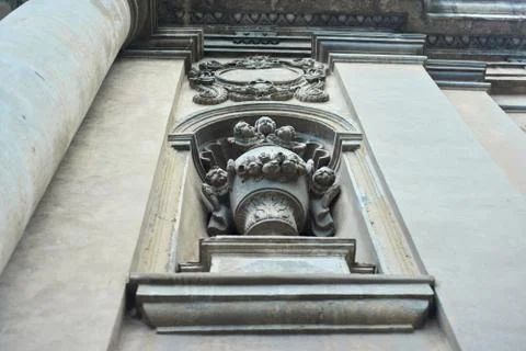 Modeling, statues, bas-reliefs decorating the facades of old houses Stock Photos