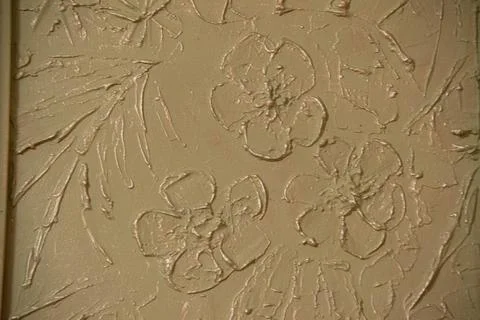 Modeling on the wall. Flowers pattern. Modeling Flowers on the wall. Stock Photos