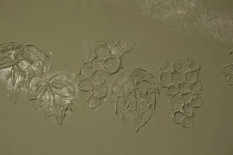 Modeling on the wall. Grapes pattern. Modeling grapes on the wall. Foto stock