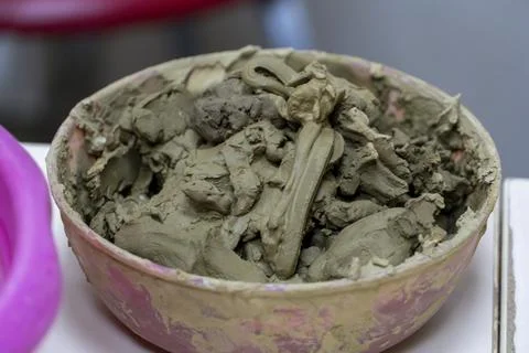 Modelling clay in the pot Stock Photos