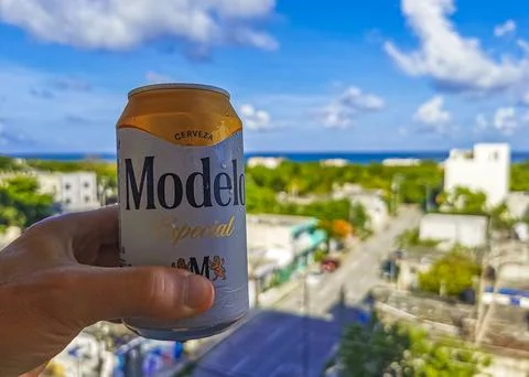 Modelo beer can cityscape caribbean beach panorama Playa del Carmen. Stock Photos