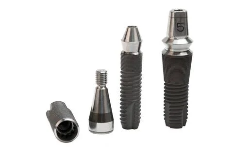 Models of dental titanium implants Models of dental titanium implants Copy... Stock Photos