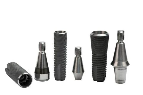Models of dental titanium implants Models of dental titanium implants Copy... Stock Photos