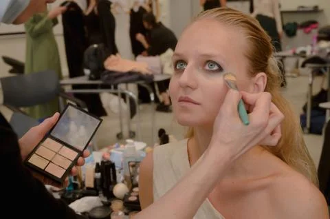 Models do a make-up and hairstyle before start the SEMILETOVA fashion show. Foto stock